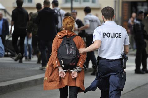 Woman Arrested And Handcuffed Behind Back In France Handcuffs Maybe Rivolier Or Manurhin Type