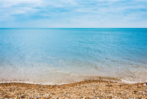 Kostenlose foto Strand Meer Küste Natur Sand Rock Ozean Horizont Himmel Sonnenlicht