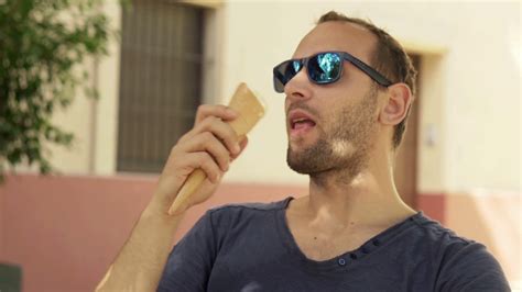 Happy Man Eating Ice Cream In The City Stock Video Footage 0018 Sbv