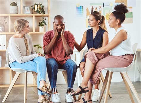 Premium Photo Community Mental Health And Support With Group Comfort Colleague After Bad News