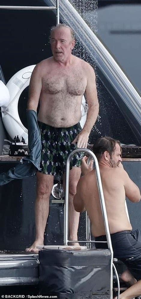 U S Bono And The Edge Go Shirtless During Beach Day