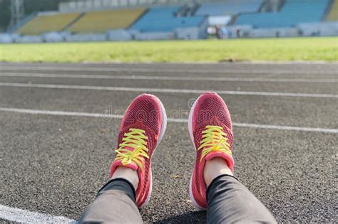 Stadium Track Background Treadmill Female Legs In Sneakers Healthy
