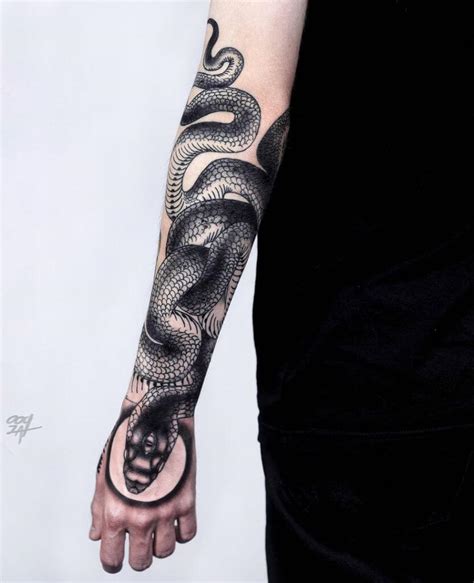 Do you want a traditional design or something more contemporary? 50+ Cool Snake Tattoo Ideas Who Love Elongated Lines
