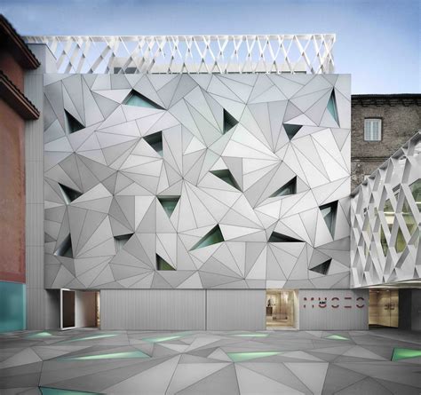 Light Supplying Triangular Holes Define Madrids Abc Museum Facade