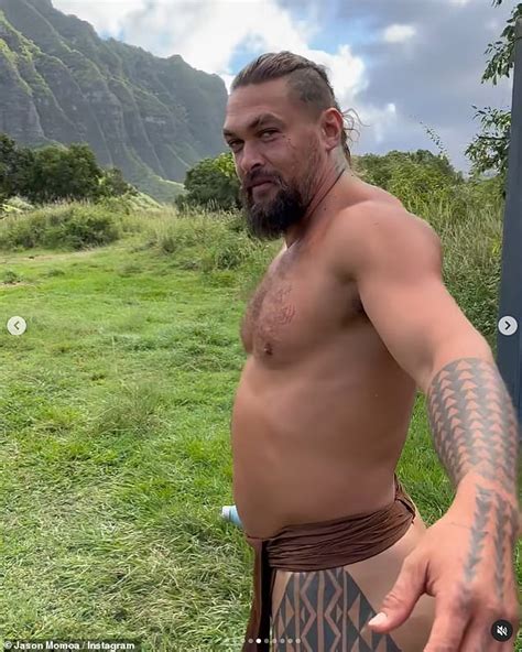 jason momoa flashes his backside while stripping down to traditional hawaiian malo in steamy
