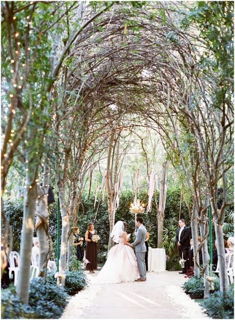 Enchanting Garden Wedding With Twinkle Lights And A Floral