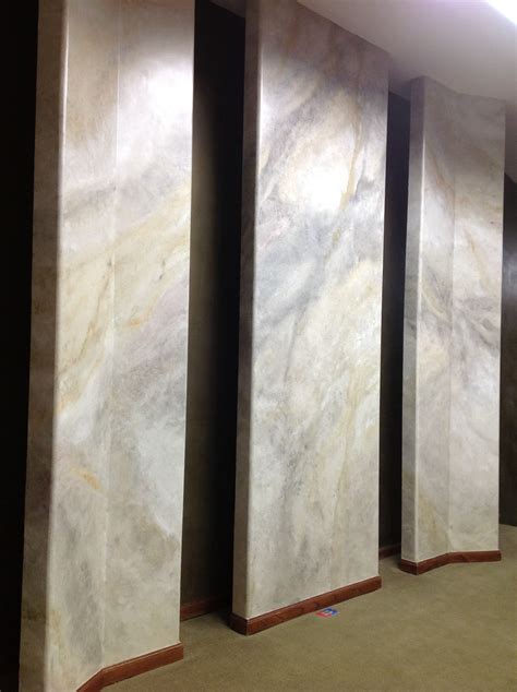 Faux Marble On Sheetrock Panels Gives The Illusion Of Slabs Of White