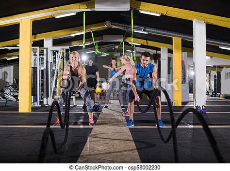 Sports Couple Doing Battle Ropes Cross Fitness Exercise Young Fit