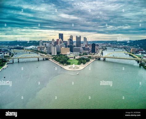 An Aerial View Of Pittsburgh Downtown Skyline With Bridges On Under