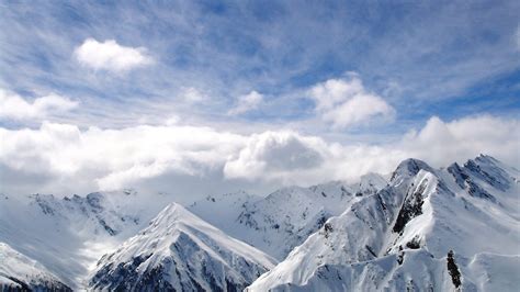 Free Download Mountains Winter Snow Clouds White Sky Wallpaper