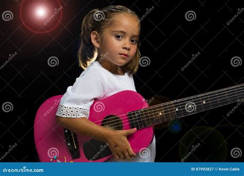 Young Girl Holding Guitar On Stage Stock Image Image Of Girl Young