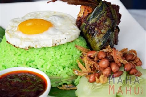 Nasi lemak is a dish that comprises rice made fragrant with coconut cream and pandan leaves. Nasi Lemak Hijau di Savaro By Felda Unik | Maha Mahu Makan