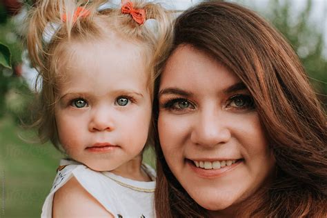 Closeup Of Mother And Daughters Face By Stocksy Contributor Leah Flores Stocksy