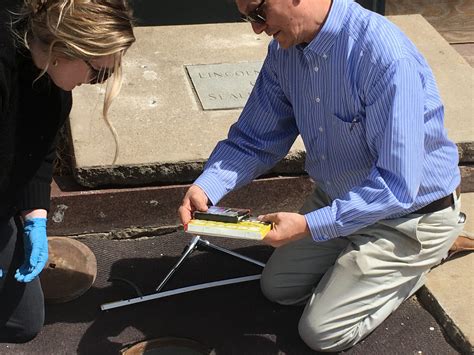 City Leaders Open Time Capsule Buried Outside of Pershing Center Since
