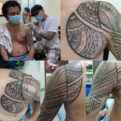 Custom half sleeve freehand filipino tribal tattoo done by luigi ...