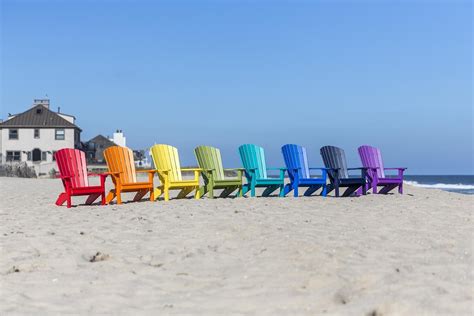 Outdoor poly swivel glider chair collection. Sports Team Poly Lumber Outdoor Chair from DutchCrafters Amish