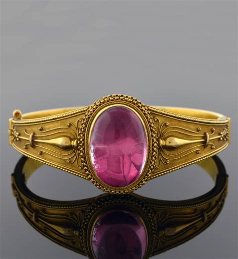The book is made from 6 sheets of 24 carat gold, bound together with rings. Etruscan Revival Bangle | Gold bangles, Gold bangle bracelet, Estate jewelry