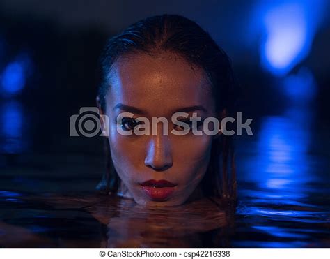 Sexy Woman At The Swimming Pool In Evening Time Closeup Face Of Sexy Asian Woman With Wet Hair