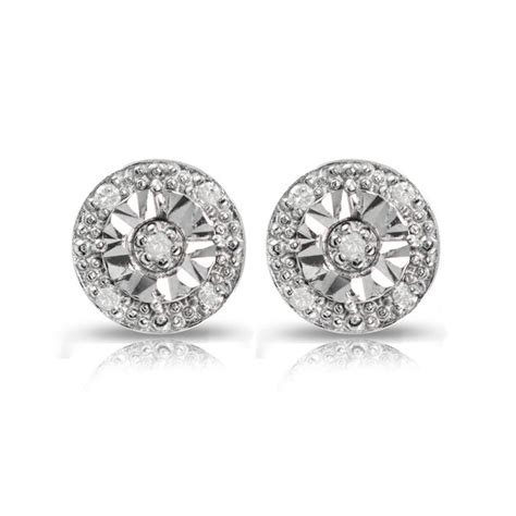 These sterling silver earrings have a beautiful sparkle with a single 6mm crystal surrounded by a circle of smaller crystals. ONLINE - Sterling Silver .10ct Diamond Miracle-Set Round ...
