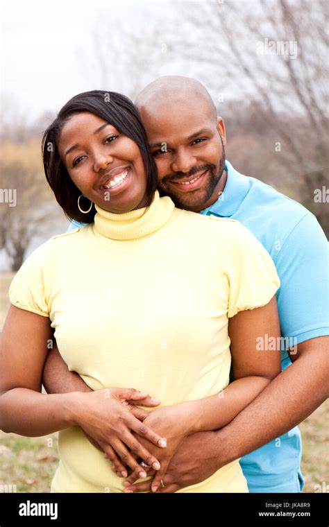 Happy African American Couple Hugging Outside Stock Photo Alamy