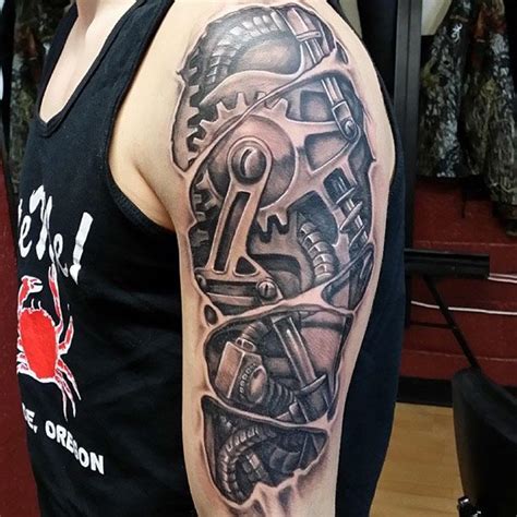 A shoulder armour tattoo is an excellent male tattoo because it gives the tattoo artist a lot of space to work with. 60+ Glorious Mechanical Arm Tattoos Easy Design and Ideas