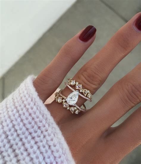 Description this stunner is the perfect band, with the perfect amount of shimmer and shine! 14kt gold double band Teardrop Floating Diamond ring ...