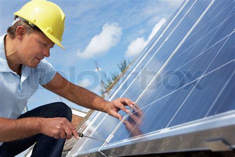 Man Installing Solar Panels Stock Image Colourbox