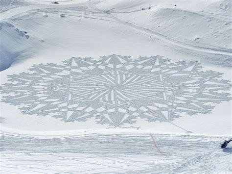 Artist Creates Massive Murals In Snow All Over The World