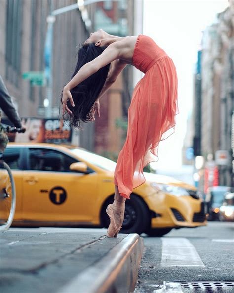beautiful photo shot of ballet dancers practicing on the streets of ny in motion