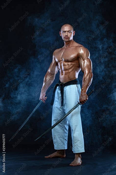 Shirtless Man Samurai With Japanese Sword Karate Fighter On Black Background With Smoke