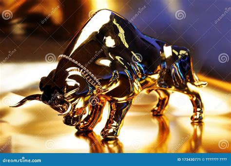 Figurine Of A Golden Bull On A Shining Background Stock Image Image
