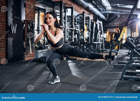 Merry Fit Woman Doing Leg Workout In Gym Stock Photo Image Of