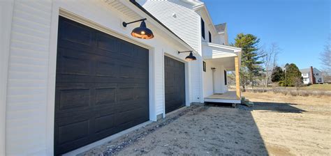 Our 502 farmhouse garage door style exudes modern farmhouse styling with refined, functional details from top to bottom. Black Garage Doors in 2020 | Modern farmhouse, Garage ...