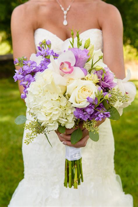 Purple And White Bridal Bouquet With Hydrangeas Roses And Orchids