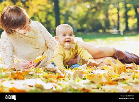 Woman Looking After Child Hi Res Stock Photography And Images Alamy