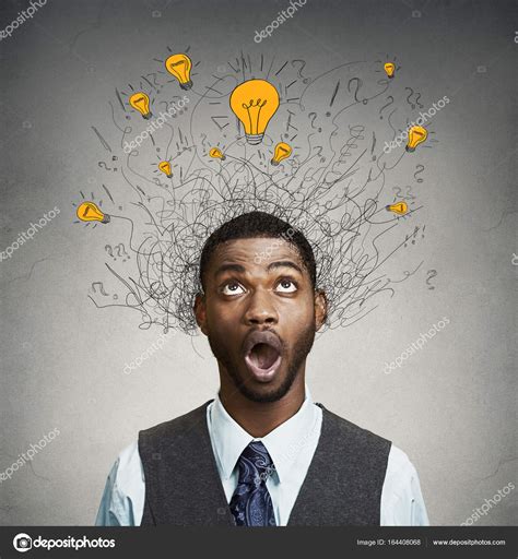 Young Man With Many Idea Light Bulbs Above Head Looking Up — Stock