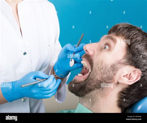 Doctor Examines The Oral Cavity On Tooth Decay Caries Protection