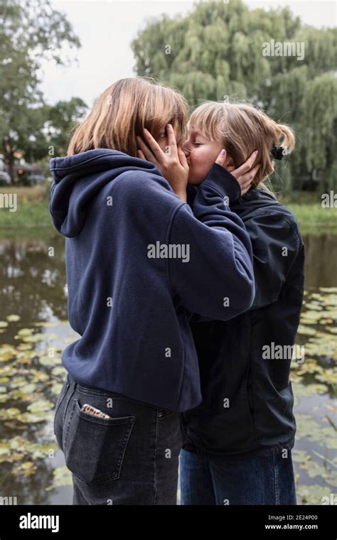 Two Teenage Girls Kissing Stock Photo Alamy