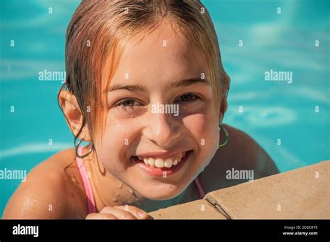 Girl Looking Away While Swimming In Pool Excited Girl Looking Away