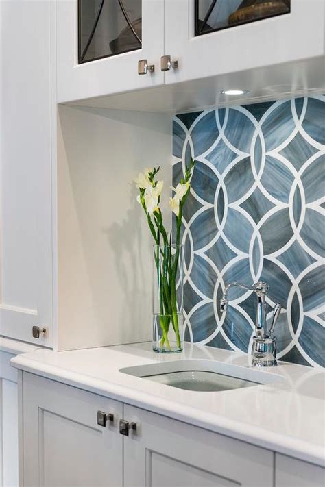 Blue Geometric Kitchen Backsplash Tiles With White Cabinets