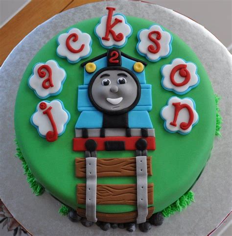 Thomas the train birthday cake topper set featuring thomas and friends with decorative themed accessories. Thomas the Train | Train cake, Thomas train cake, Kids cake