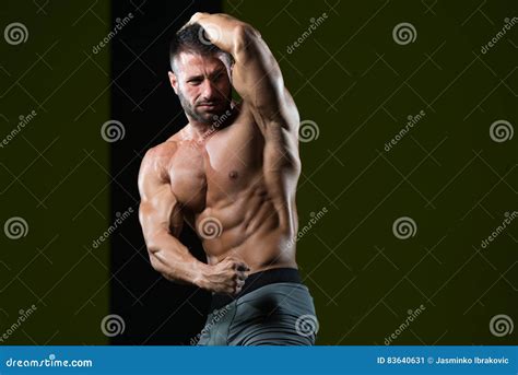 Young Bodybuilder Flexing Muscles Stock Image Image Of Adult