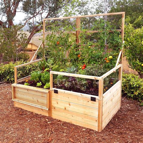 High for a total height of 67 in. 6 ft. x 3 ft. Cedar Raised Garden Bed with Folding Trellis ...