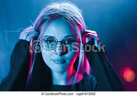 Millennial Enigmatic Pretty Woman With Unusual Dyed Hairstyle Near