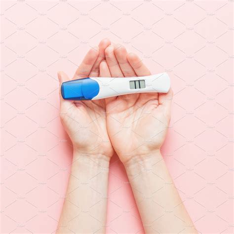 Woman Shows Positive Pregancy Test Featuring Pregnancy Test And Woman People Images