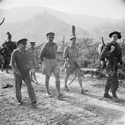 Personalities The Commander Of The 8th Army General Sir Oliver Leese Walking Through Cassino