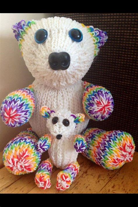 A Crocheted Polar Bear And Two Smaller Bears