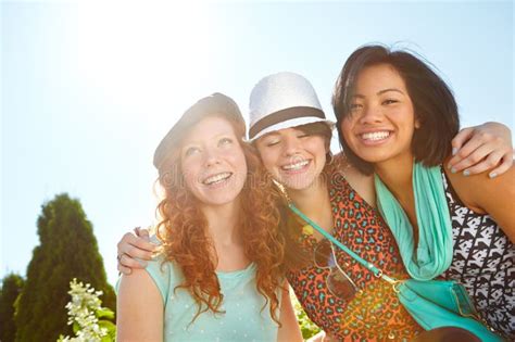Bright Sunny Smiles Three Teenage Girls Smiling Happily With Their