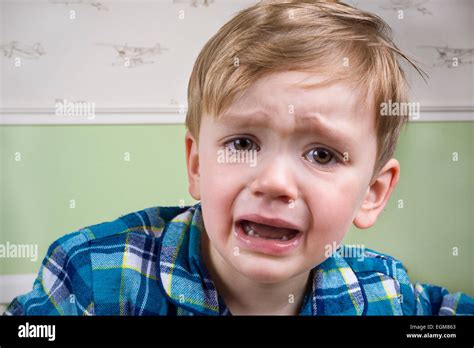 Small Boy Crying Dramatically Before Bedtime Stock Photo Alamy