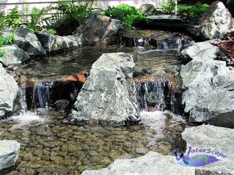 Pondless water features are a great way to enjoy the soothing sounds of ...
